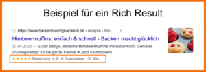 Beispiel für ein Rich Result: Rezept für Himbeermuffins mit 5-Sterne Bewertung unter dem regulären Snippet